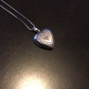 White gold heart locket necklace w Diamond.